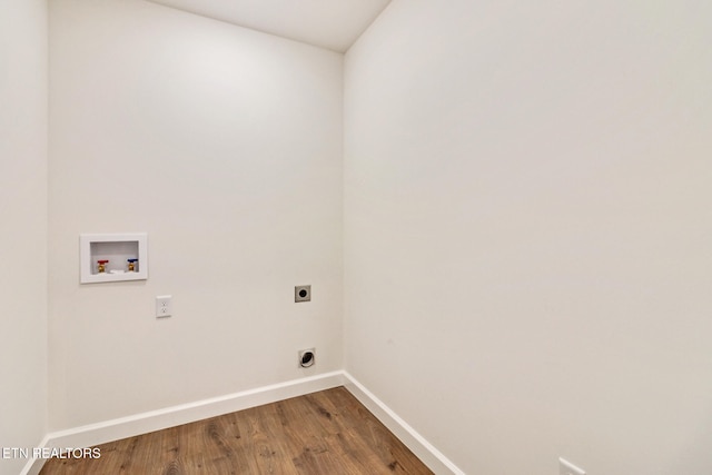 laundry room featuring washer hookup, wood-type flooring, and hookup for an electric dryer