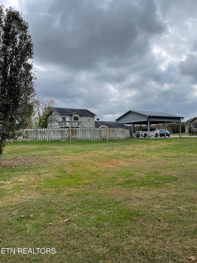 view of yard featuring a carport