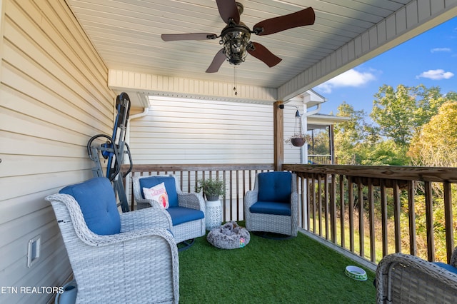 exterior space featuring ceiling fan