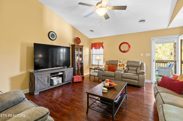 living area with vaulted ceiling, dark wood-type flooring, visible vents, and baseboards