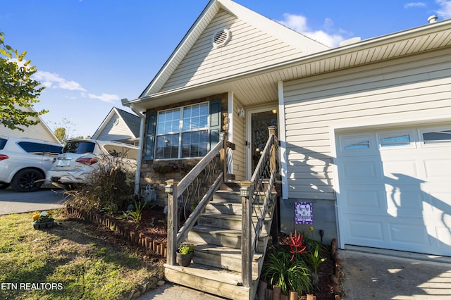 property entrance with a garage