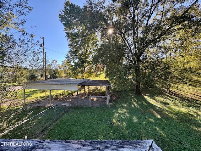 view of yard featuring a carport