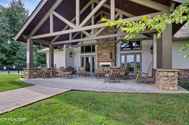 view of patio featuring french doors and ceiling fan