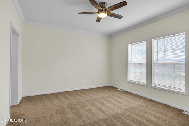 unfurnished room with light carpet, ornamental molding, and ceiling fan