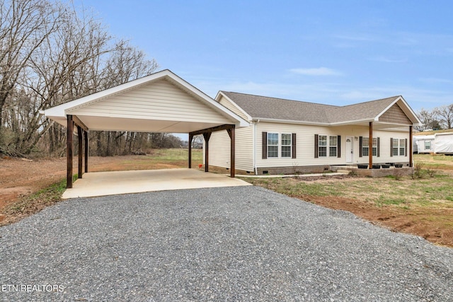 view of front of property with covered porch and a carport