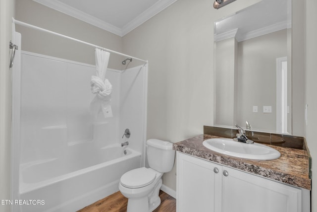 full bathroom featuring toilet, ornamental molding, hardwood / wood-style floors, vanity, and shower / bathtub combination with curtain