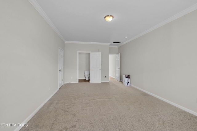 carpeted empty room with ornamental molding