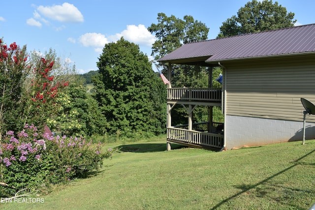 view of yard with a wooden deck