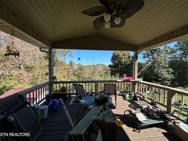 wooden deck with ceiling fan