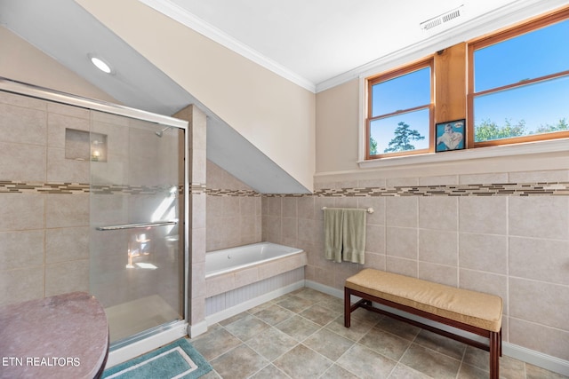 bathroom featuring tile patterned flooring, crown molding, and shower with separate bathtub