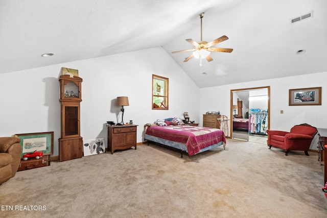 carpeted bedroom featuring lofted ceiling and ceiling fan