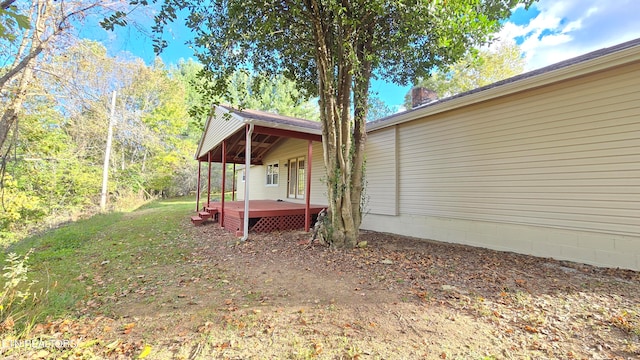 view of yard featuring a deck