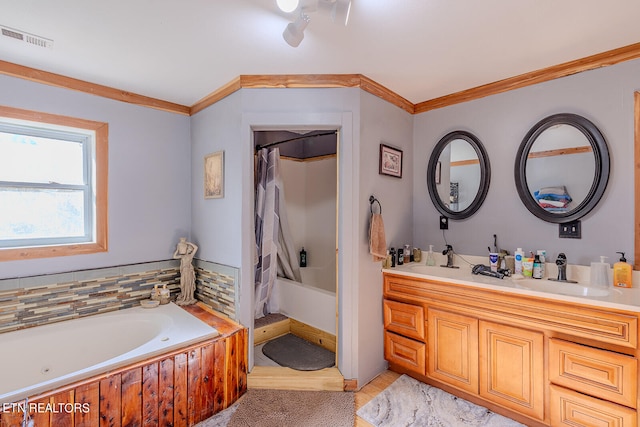 bathroom with vanity, shower / bath combo with shower curtain, and ornamental molding