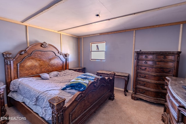 bedroom with light colored carpet