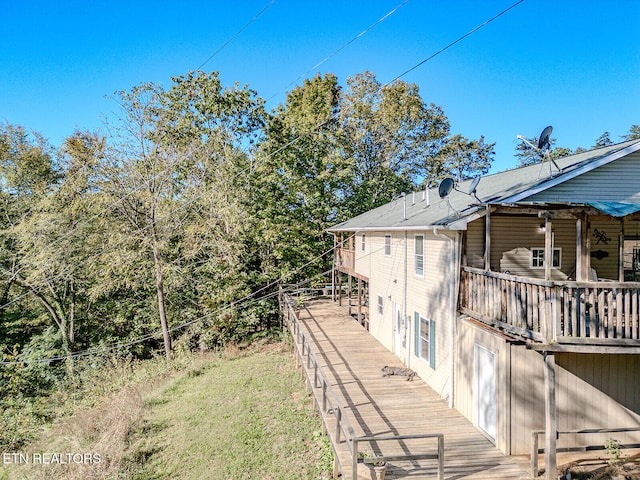 view of home's exterior with a deck