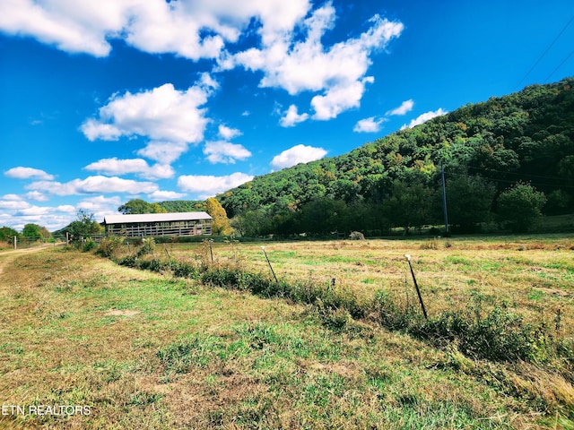 mountain view with a rural view