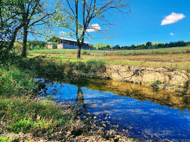 view of water feature featuring a rural view