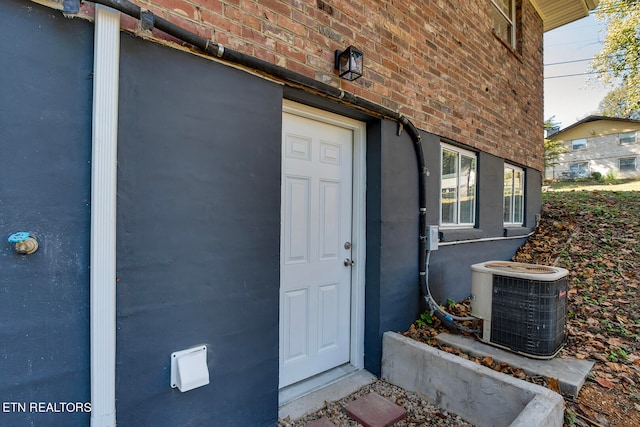 property entrance featuring cooling unit