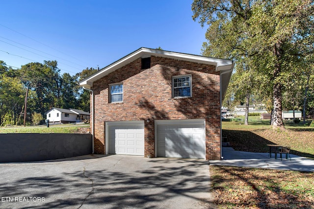 view of home's exterior featuring a garage