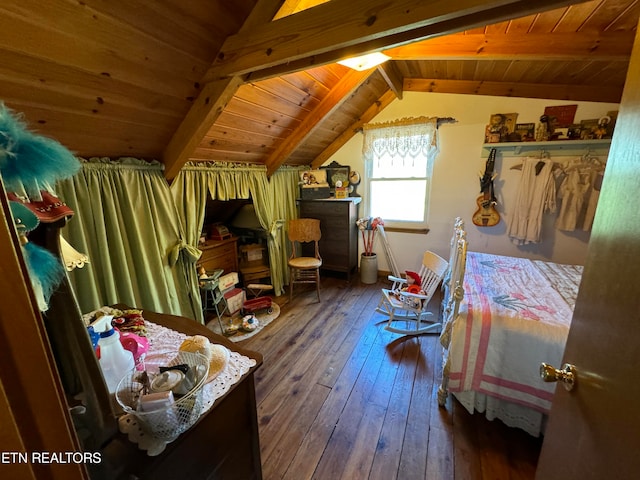 bedroom featuring vaulted ceiling with beams, hardwood / wood-style floors, and wooden ceiling