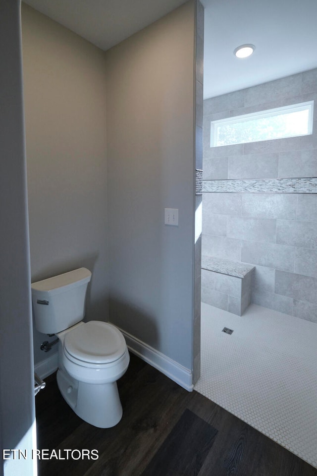 bathroom featuring toilet and hardwood / wood-style floors