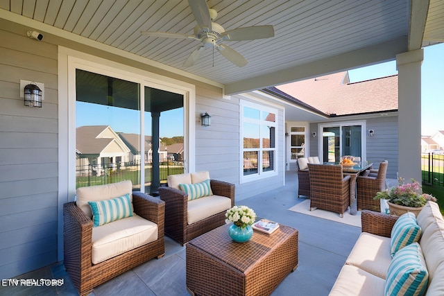 view of patio / terrace with an outdoor living space and ceiling fan