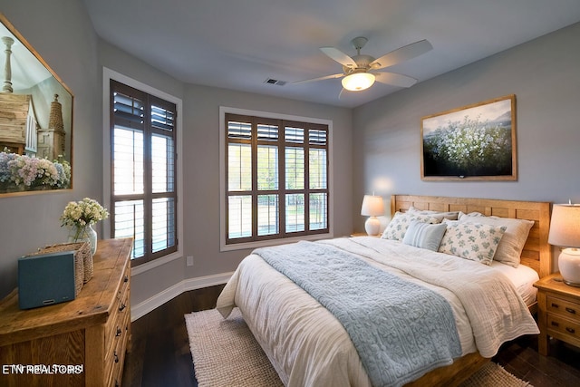 bedroom featuring dark wood-type flooring and ceiling fan