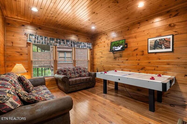 playroom featuring wood ceiling, wood walls, wood finished floors, and recessed lighting