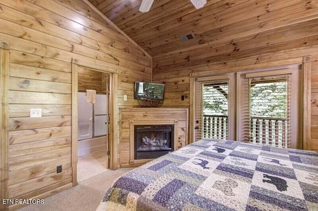 carpeted bedroom featuring vaulted ceiling, wooden ceiling, wood walls, and access to exterior