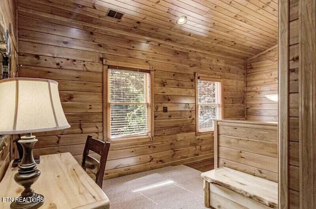 office featuring vaulted ceiling, wooden ceiling, and wood walls