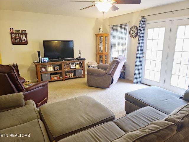 living room with carpet flooring and ceiling fan