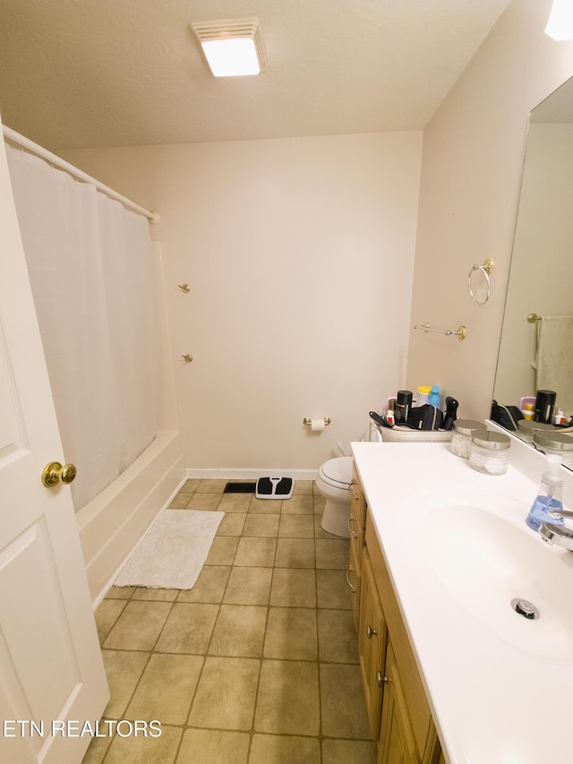 full bathroom with tile patterned flooring, vanity, shower / bath combination with curtain, and toilet