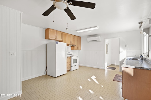 kitchen with white appliances, sink, an AC wall unit, ceiling fan, and wooden walls