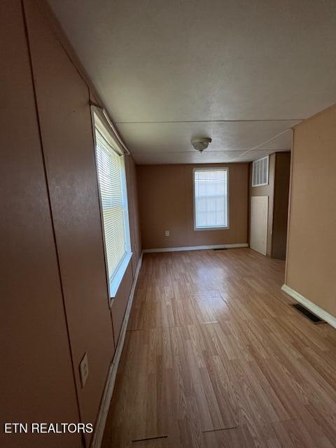 empty room featuring light wood-type flooring