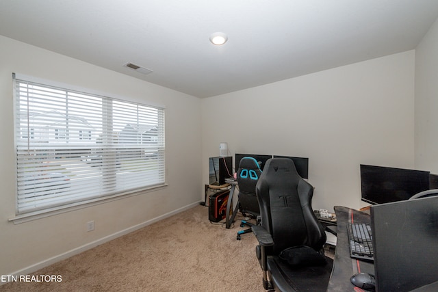 home office featuring light colored carpet