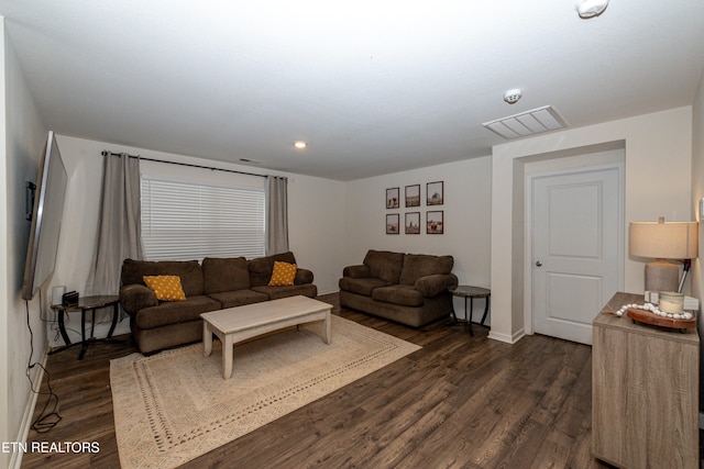 living room with dark wood-type flooring