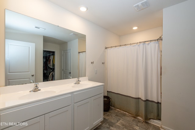 bathroom featuring vanity and a shower with curtain