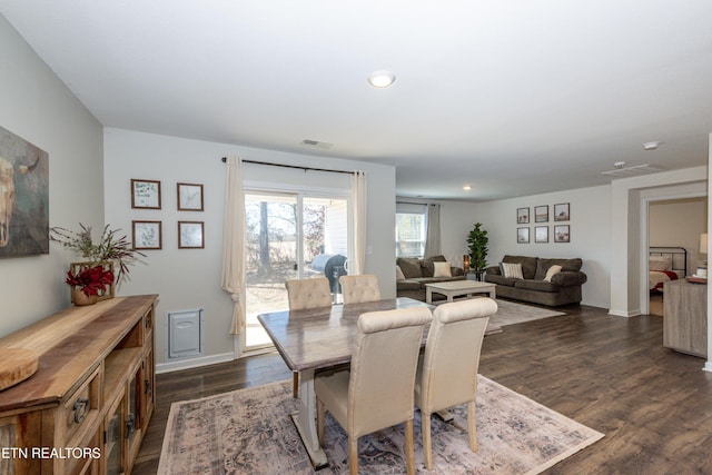 dining room featuring recessed lighting, dark wood-style flooring, visible vents, and baseboards