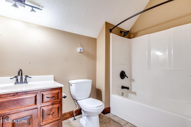 full bathroom featuring vaulted ceiling, bathtub / shower combination, tile patterned flooring, toilet, and a textured ceiling