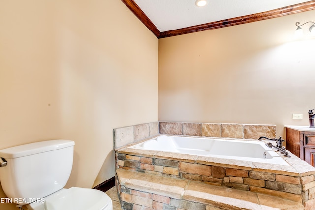 bathroom with tiled tub, ornamental molding, vanity, and toilet