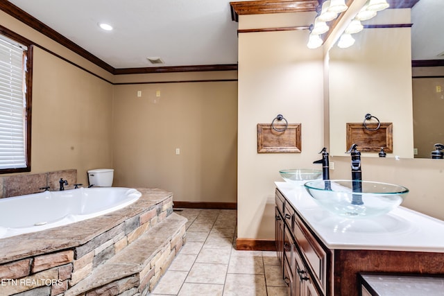 bathroom with tile patterned flooring, vanity, ornamental molding, and a bath