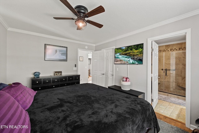 bedroom featuring hardwood / wood-style floors, ceiling fan, crown molding, and ensuite bath