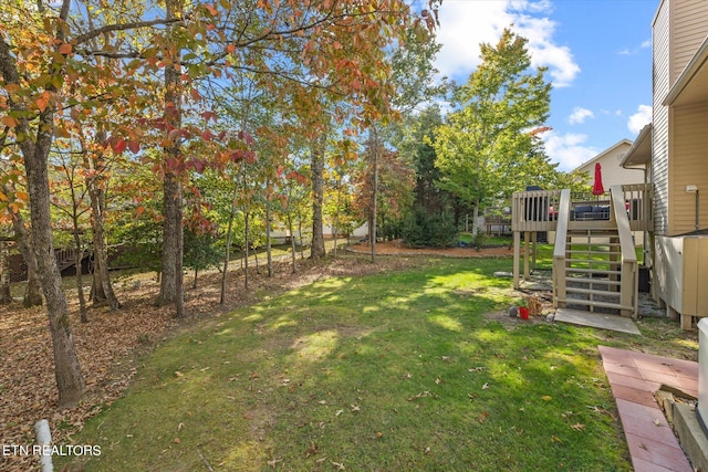 view of yard featuring a deck