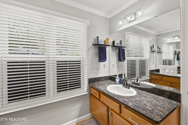 bathroom with vanity and crown molding