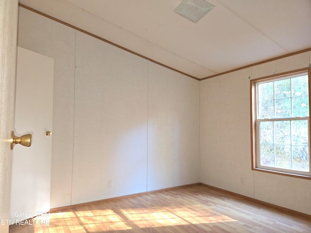 unfurnished room featuring light hardwood / wood-style flooring