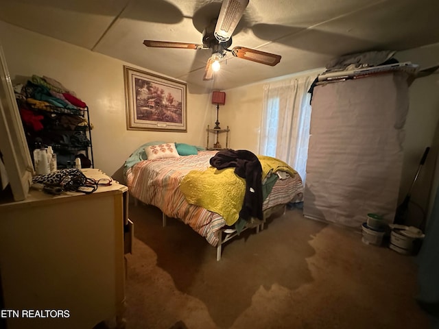 carpeted bedroom with ceiling fan