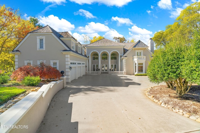 view of front of property with a garage