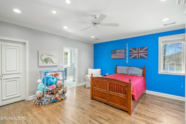 bedroom with light hardwood / wood-style flooring, multiple windows, and ceiling fan