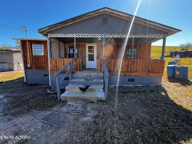 view of front of home featuring covered porch