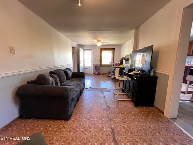 living room featuring ceiling fan